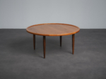 Scandinavian modern round teak coffee table from Denmark, 1960s, three-quarter view