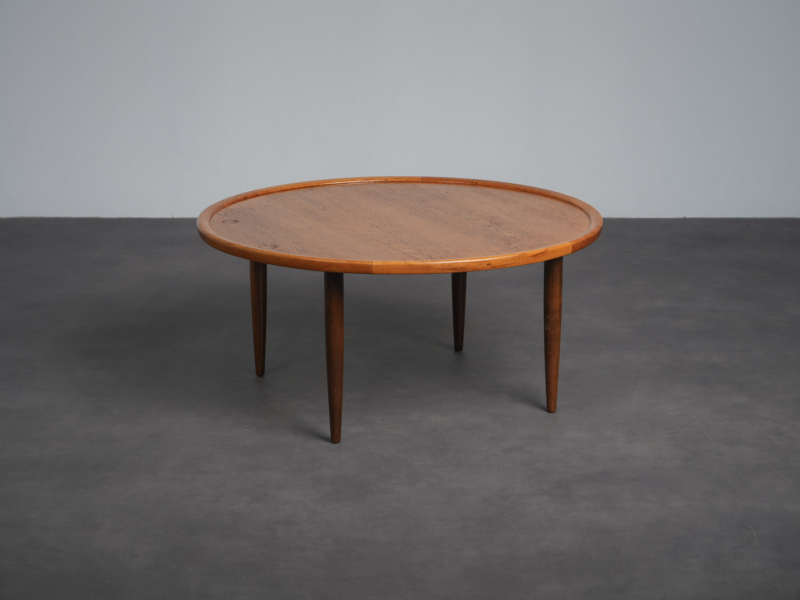 Scandinavian modern round teak coffee table from Denmark, 1960s, three-quarter view