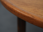 Scandinavian modern round teak coffee table from Denmark, 1960s, raised rim detail